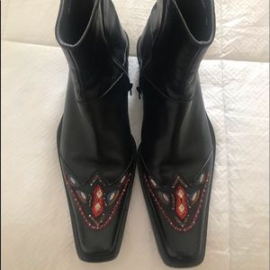 Cesare Paciotti black leather boots with detail